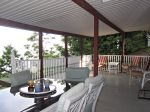 Many places to sit on the covered deck